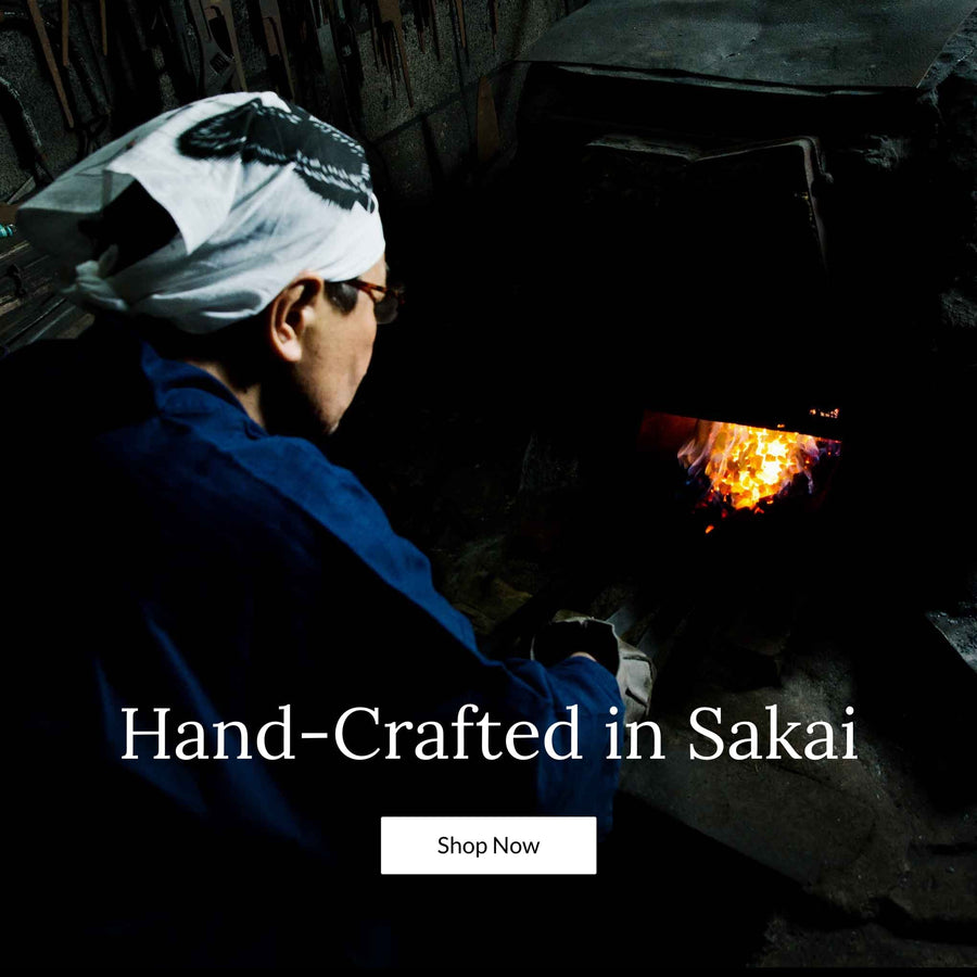 Blacksmith forging Japanese knives in Sakai City.